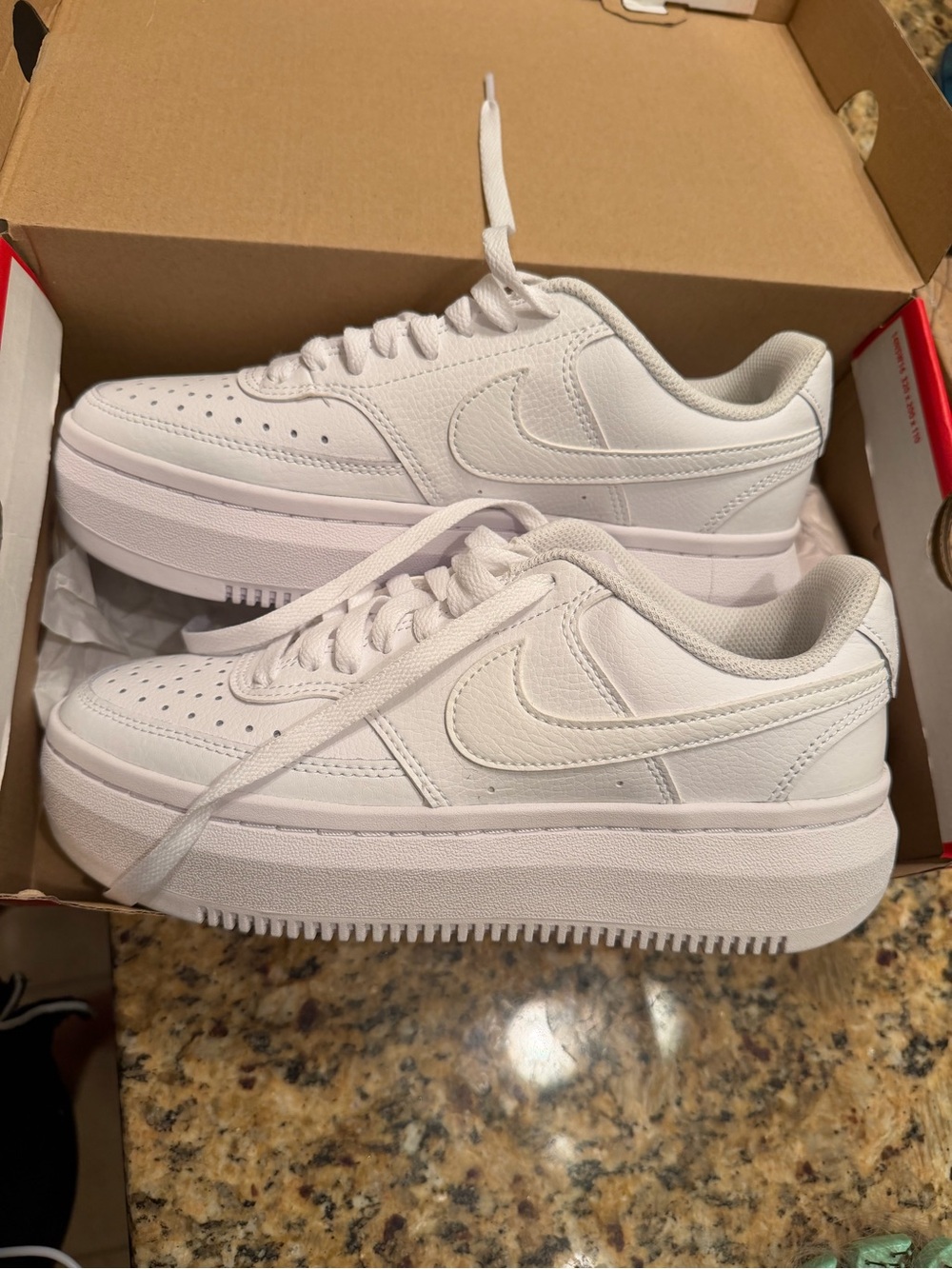 Nike Women’s All-White Platform Sneakers